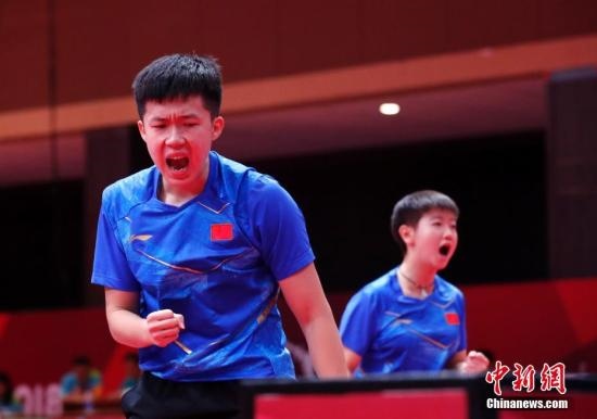 資料圖：雅加達亞運會，王楚欽/孫穎莎奪得混雙冠軍。 <a target='_blank' href='/'>中新社</a>記者 劉關(guān)關(guān) 攝