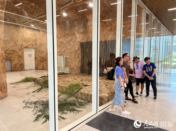 當(dāng)?shù)赜慰团c“四?！焙嫌?。人民網(wǎng)記者 張志文攝