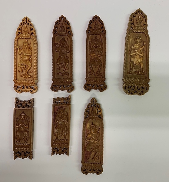 木雕牌飾（暫定名）。國(guó)家文物局供圖