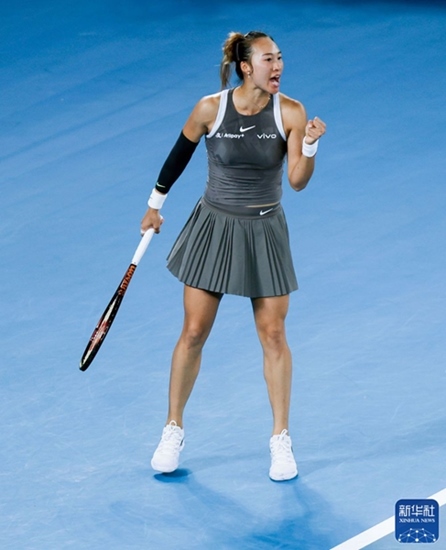 鄭欽文在比賽中慶祝得分。新華社記者 馬平 攝